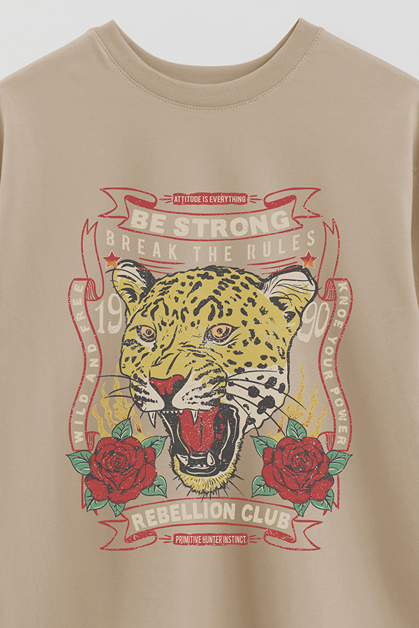REMERA OVER ESTAMPADA BE STRONG