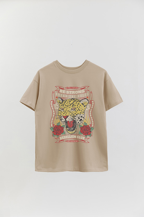 REMERA OVER ESTAMPADA BE STRONG