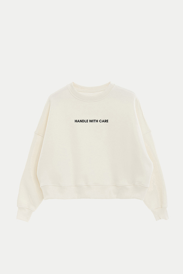 BUZO CROP ESTAMPADO MNM HANDLE WITH CARE