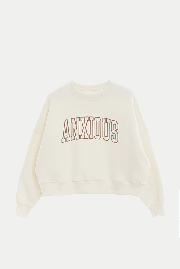 BUZO CROP ESTAMPADO VARSITY ANXIOUS