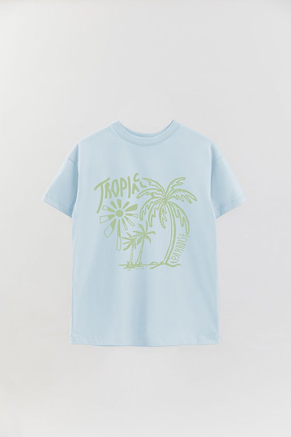 REMERA OVER ESTAMPADA TROPICAL PARADISE