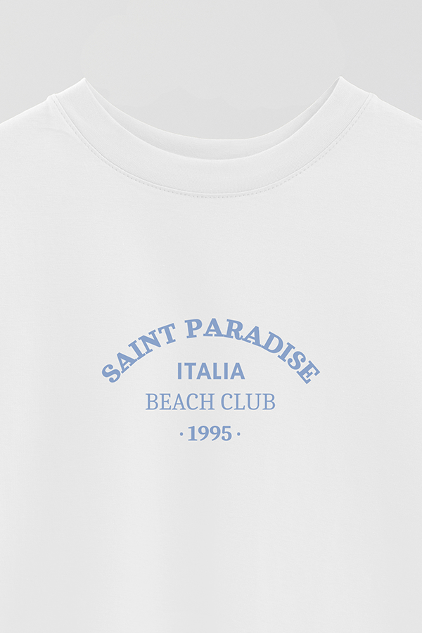 REMERA OVER ESTAMPADA CITIES SAINT PARADISE