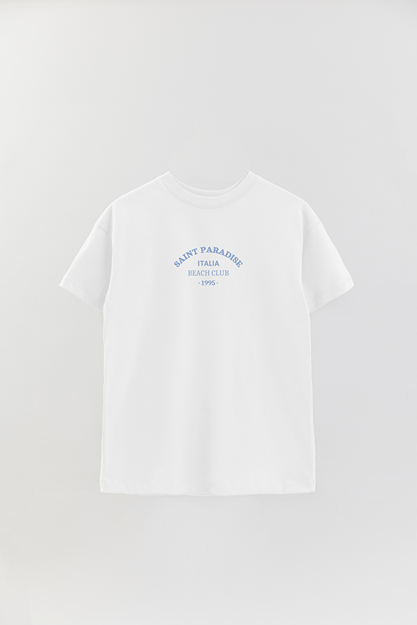 REMERA OVER ESTAMPADA CITIES SAINT PARADISE