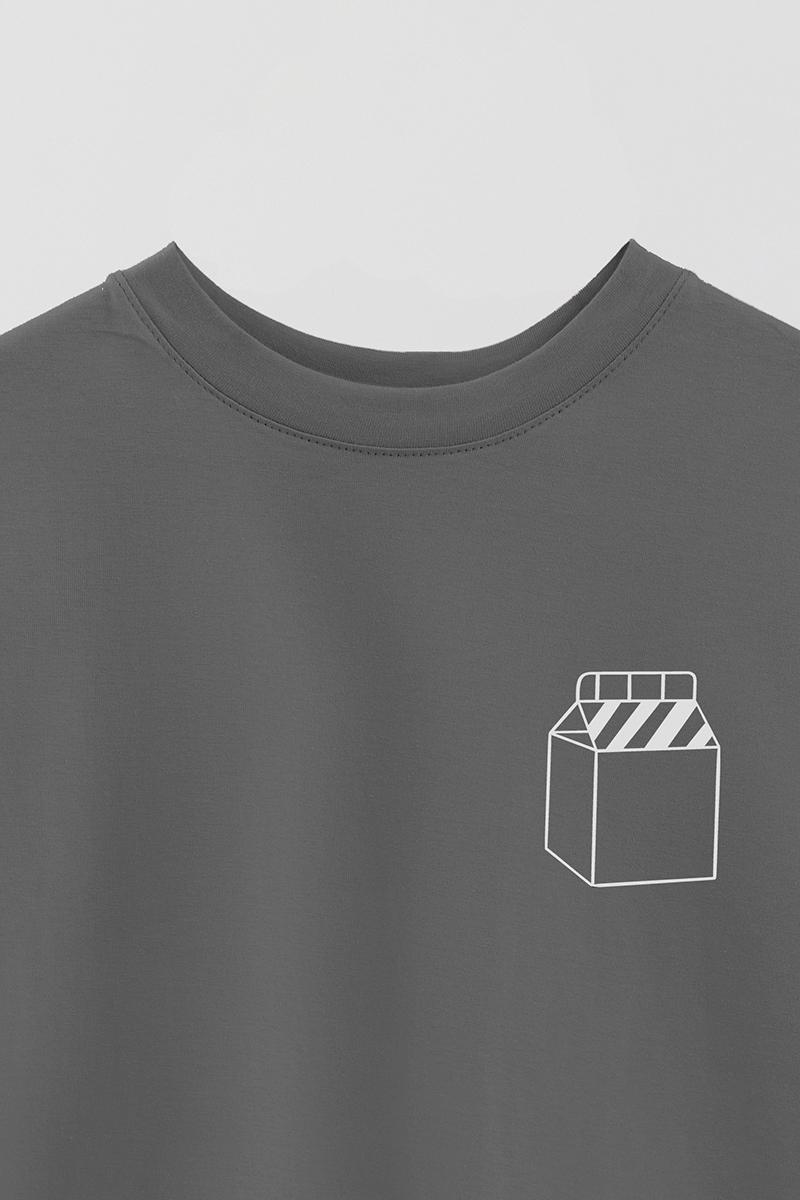 REMERA OVER ESTAMPADA UNISEX MILK