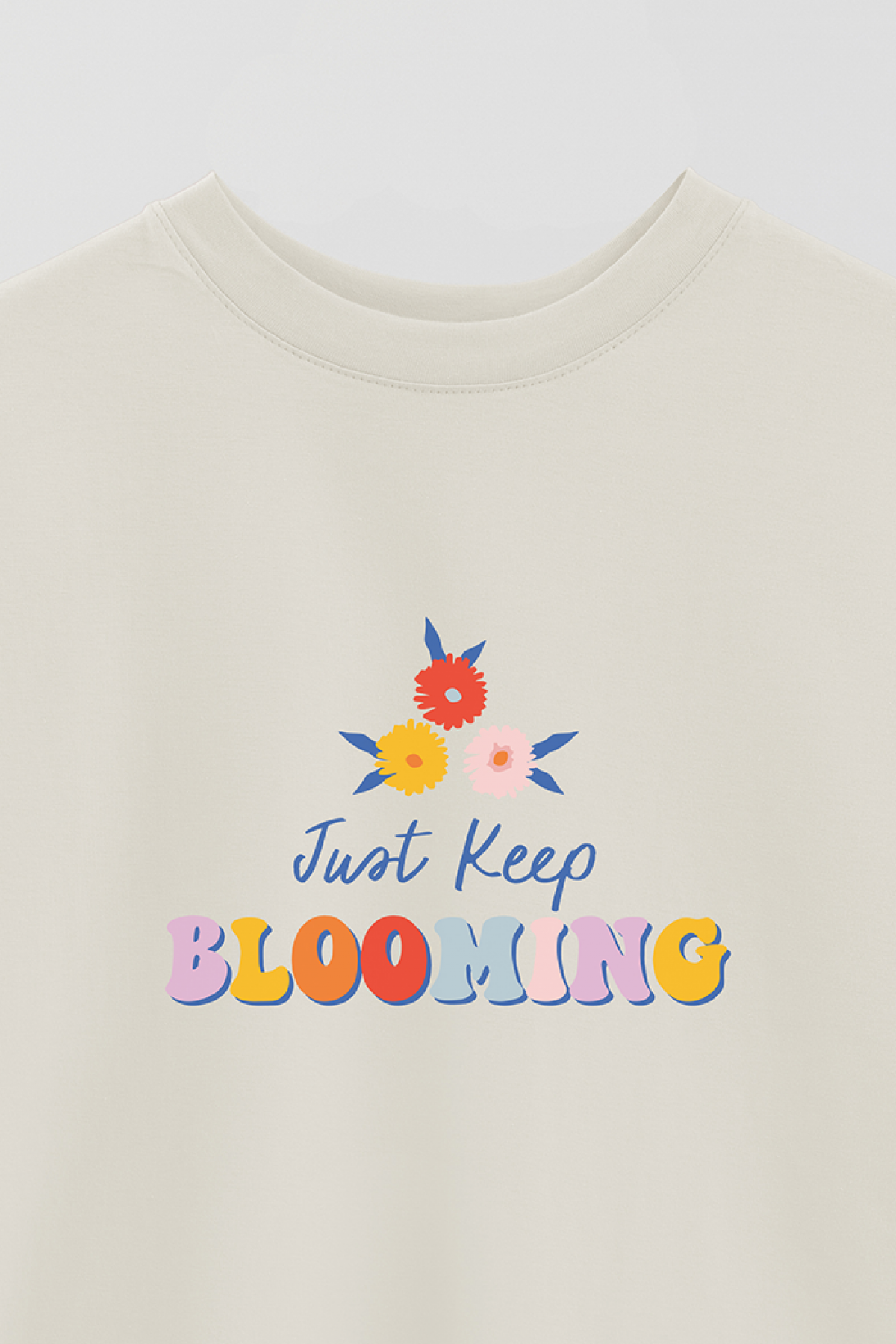 REMERA OVER ESTAMPADA SPR JUST KEEP BLOOMING