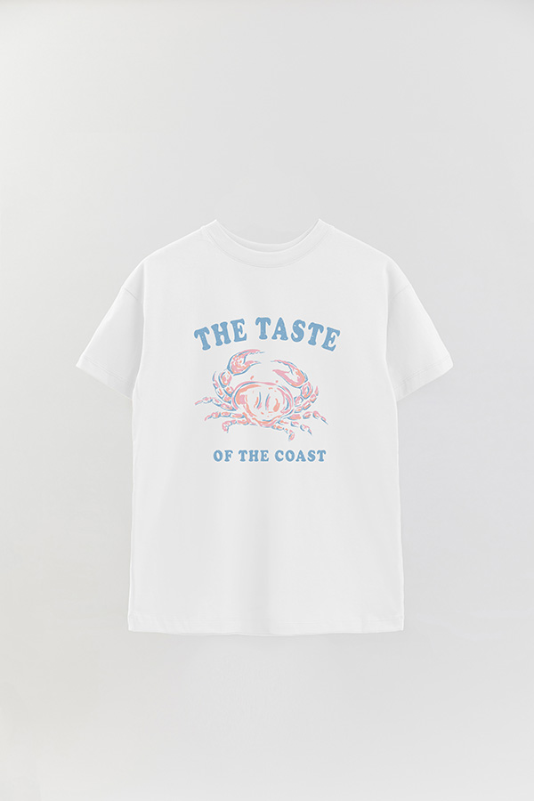 REMERA OVER ESTAMPADA THE TASTE OF THE COAST