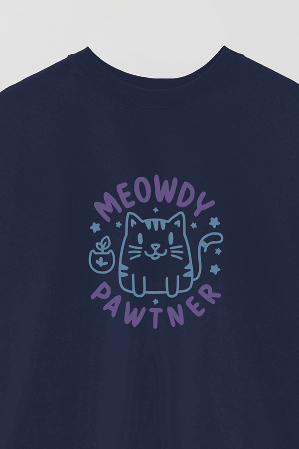 REMERA OVER ESTAMPADA CAT MEOWDY PAWTNER