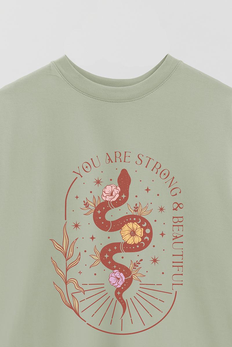 REMERA OVER ESTAMPADA MST YOU ARE STRONG AND BEAUTIFUL