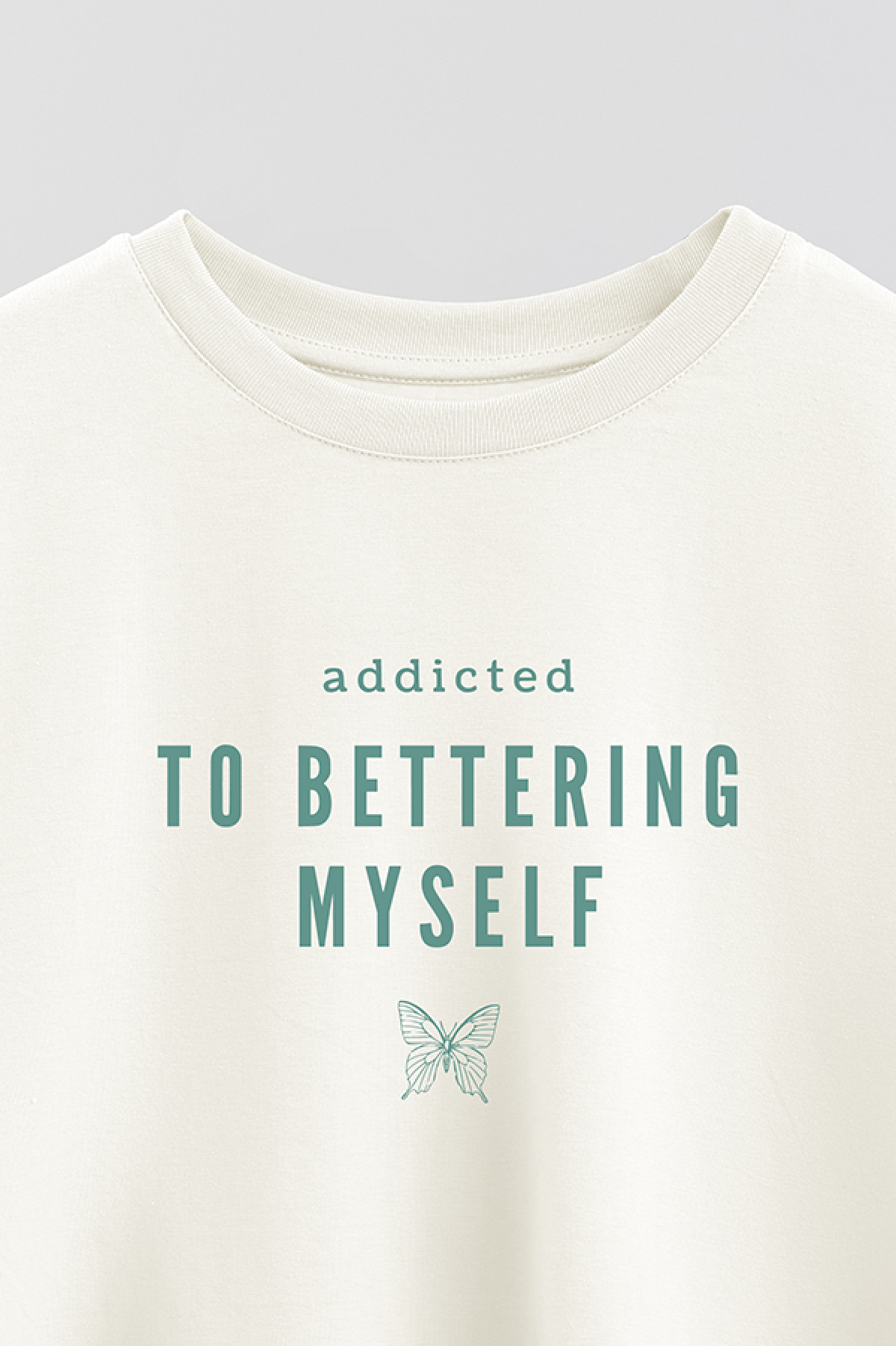 REMERA CROP ESTAMPADA WCV ADDICTED TO BETTERING MYSELF