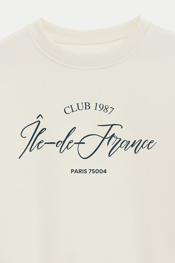 BUZO CROP ESTAMPADO VARSITY ILE DE FRANCE
