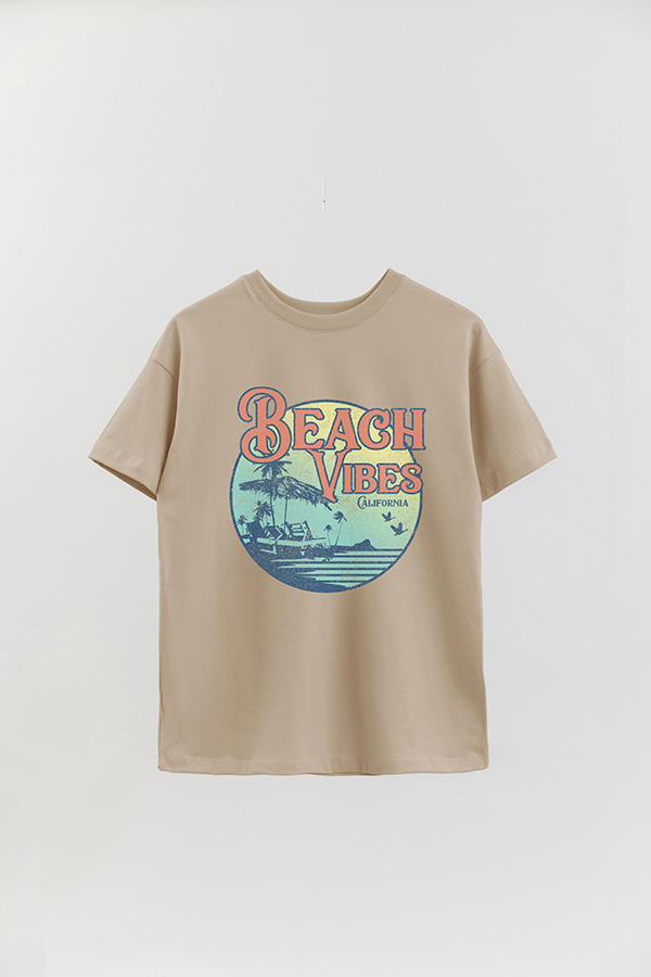 REMERA OVER ESTAMPADA BEACH VIBES RETRO