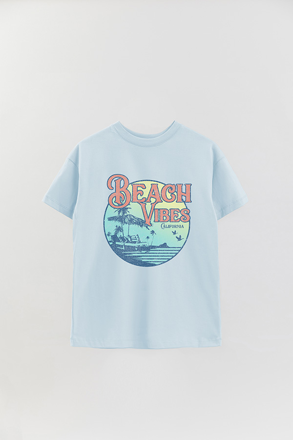 REMERA OVER ESTAMPADA BEACH VIBES RETRO