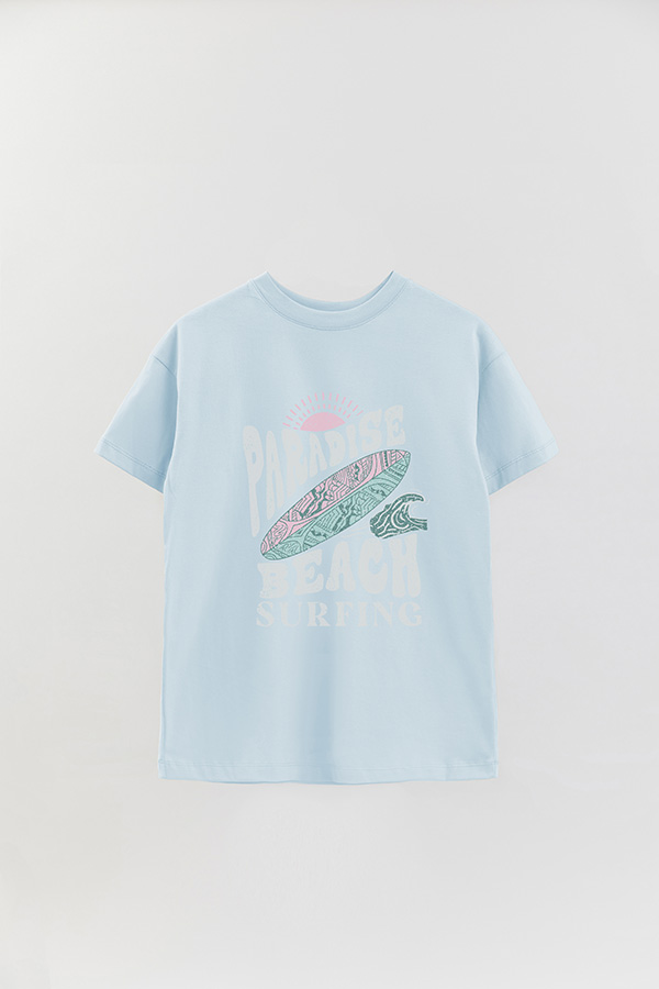 REMERA OVER ESTAMPADA PARADISE BEACH SURFING