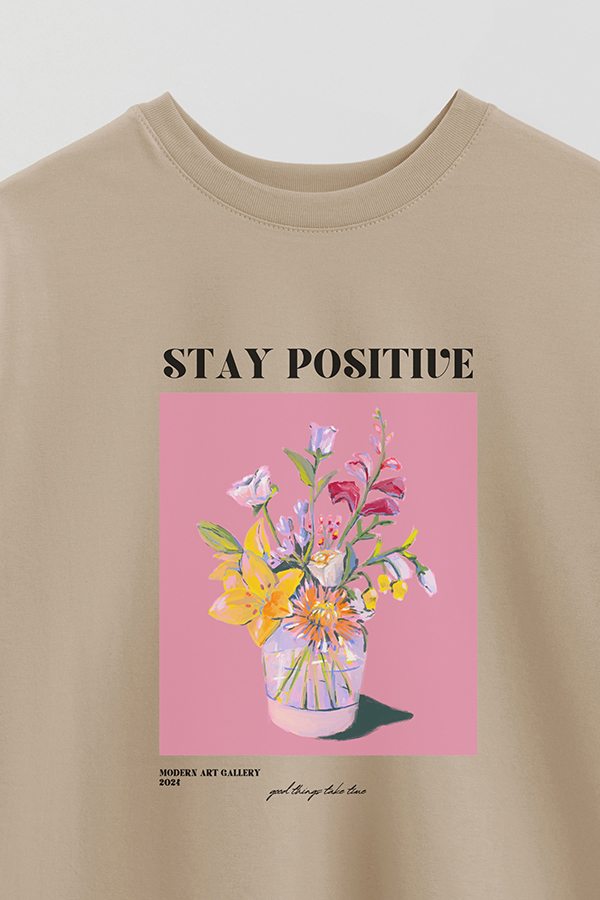 REMERA OVER ESTAMPADA GRAPHIC STAY POSITIVE