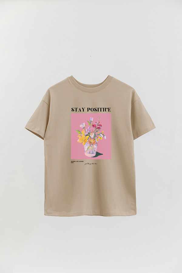 REMERA OVER ESTAMPADA GRAPHIC STAY POSITIVE