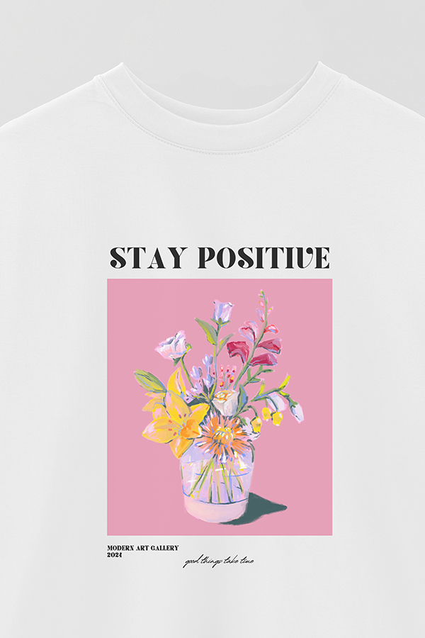REMERA OVER ESTAMPADA GRAPHIC STAY POSITIVE
