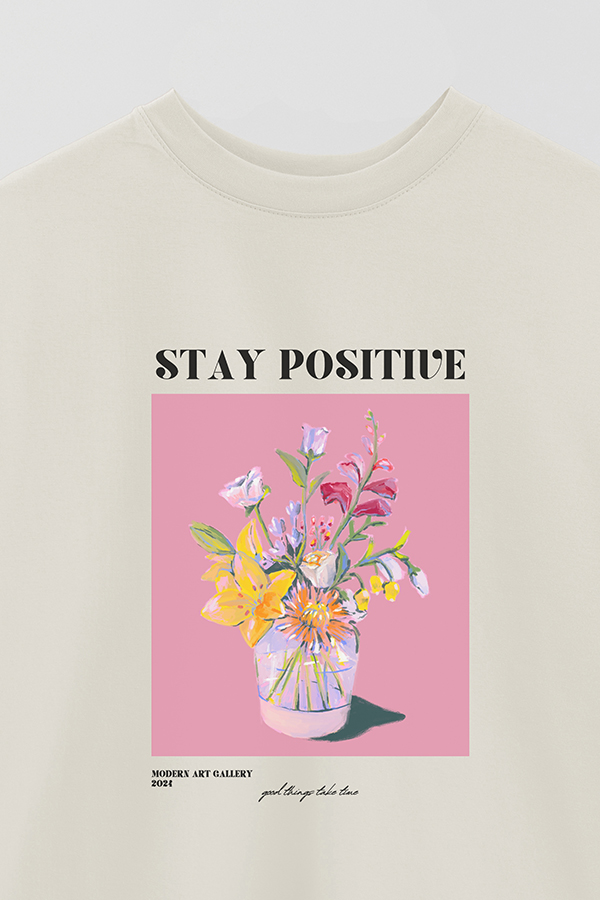 REMERA OVER ESTAMPADA GRAPHIC STAY POSITIVE