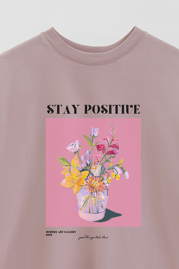 REMERA OVER ESTAMPADA GRAPHIC STAY POSITIVE