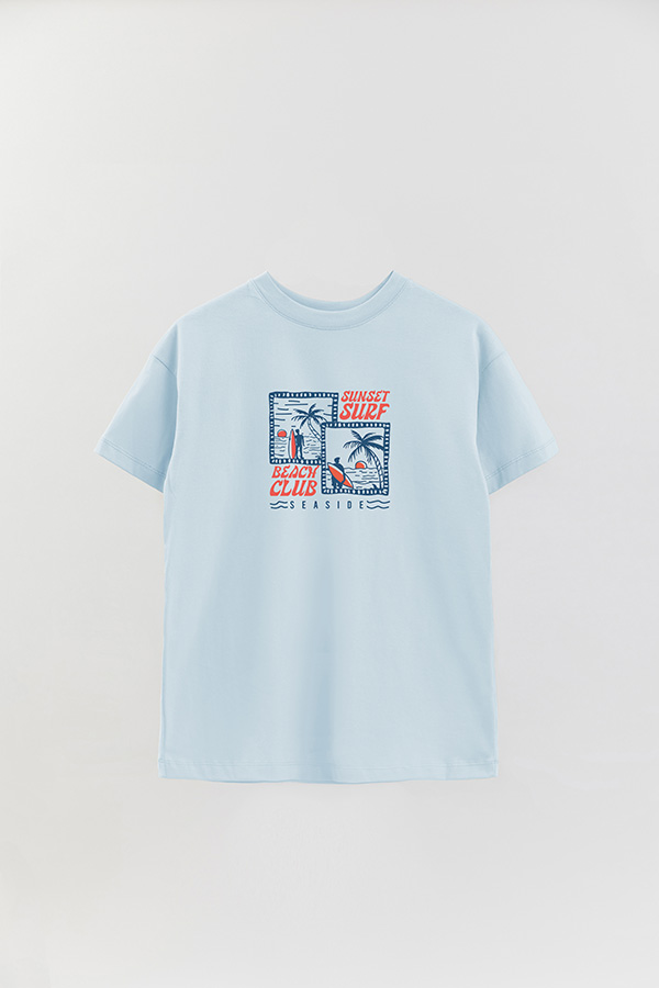 REMERA OVER ESTAMPADA SUNSET SURF