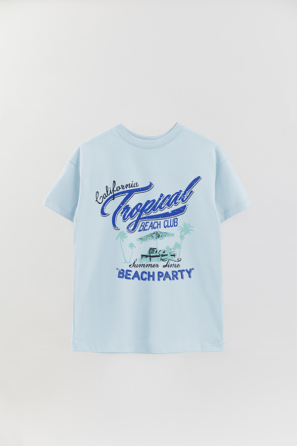 REMERA OVER ESTAMPADA CALIFORNIA TROPICAL BEACH CLUB