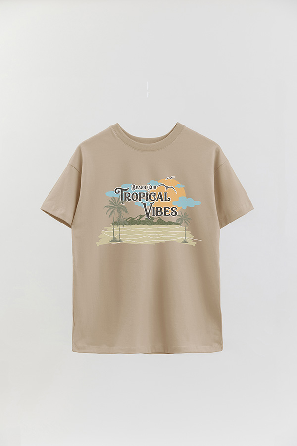 REMERA OVER ESTAMPADA BEACH TROPICAL VIBES