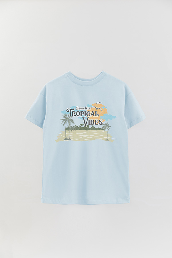REMERA OVER ESTAMPADA BEACH TROPICAL VIBES