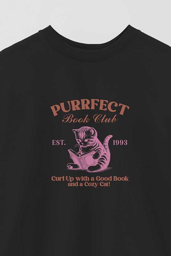 REMERA OVER ESTAMPADA CAT GOOD BOOK