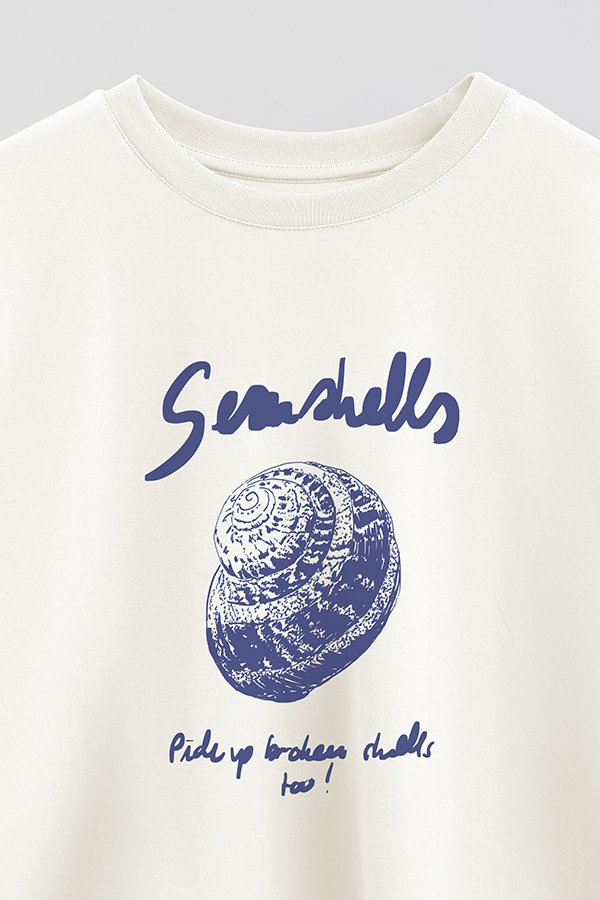 REMERA CROP ESTAMPADA BEACH SEASHELLS CARACOL